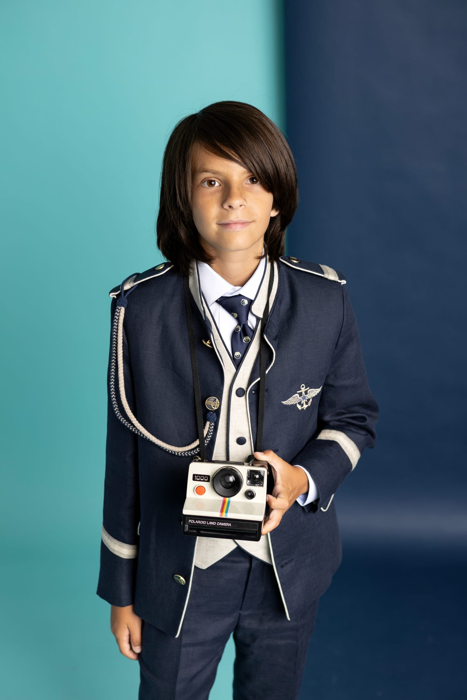 Traje de comunión niño 2027 Lior, chaqueta almirante azul marino con chaleco y cordón